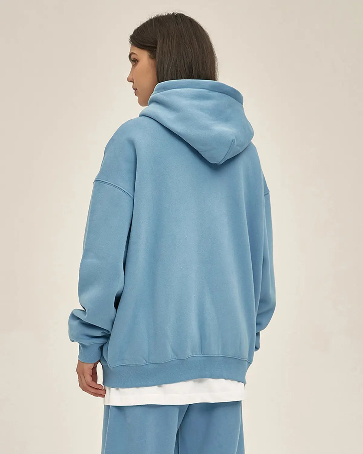 Black fleece double zip-up hoodie jacket by Flation Streetwear with a front zipper and hood, casual streetwear style.