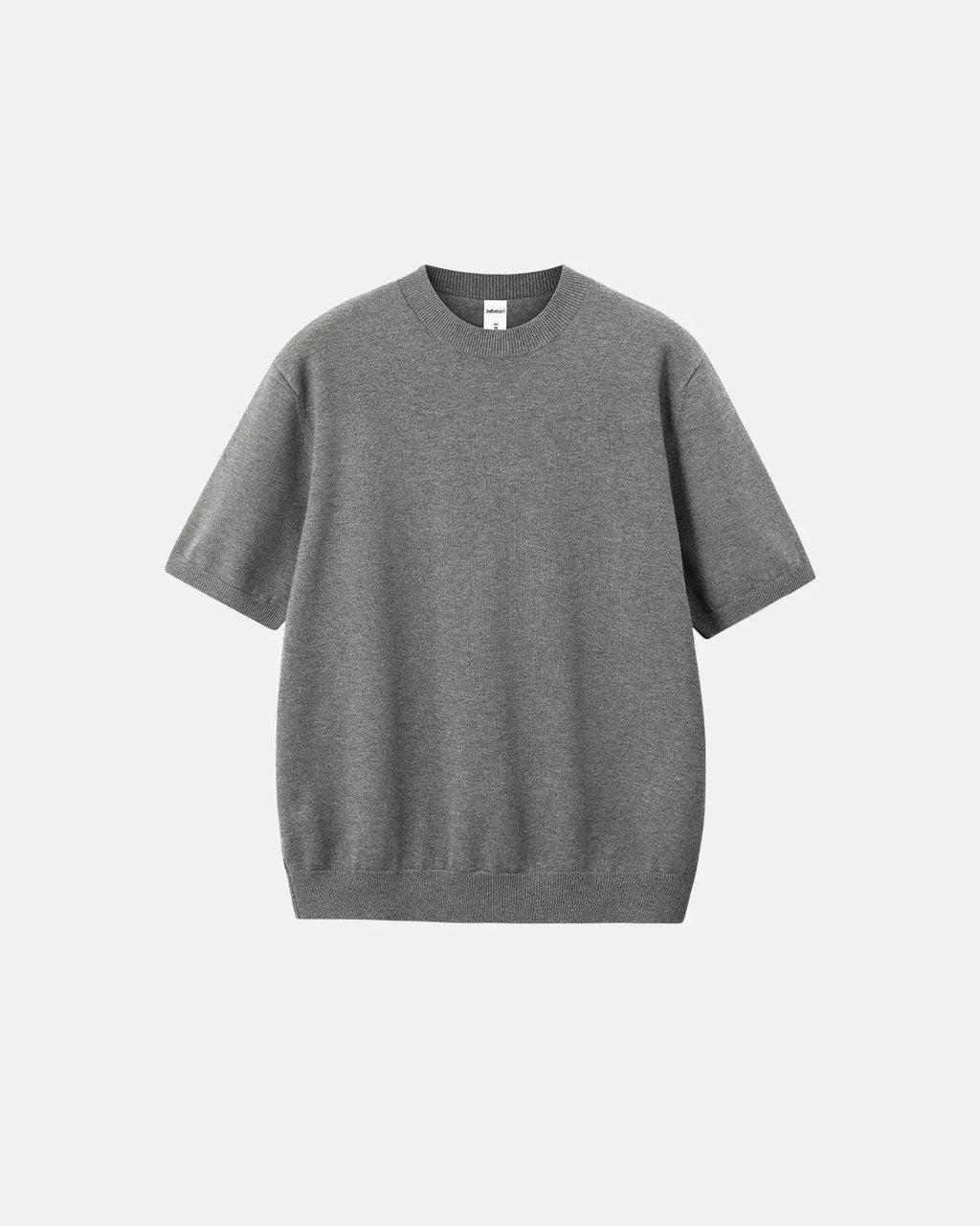 Inflation Streetwear short-sleeved crewneck sweater in knitwear, shown in a close-up of the textured fabric and classic fit.
