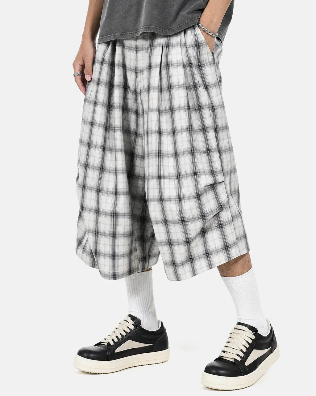 Inflation streetwear plaid longline casual shorts with a relaxed fit, featuring a red, black, and white checkered pattern.