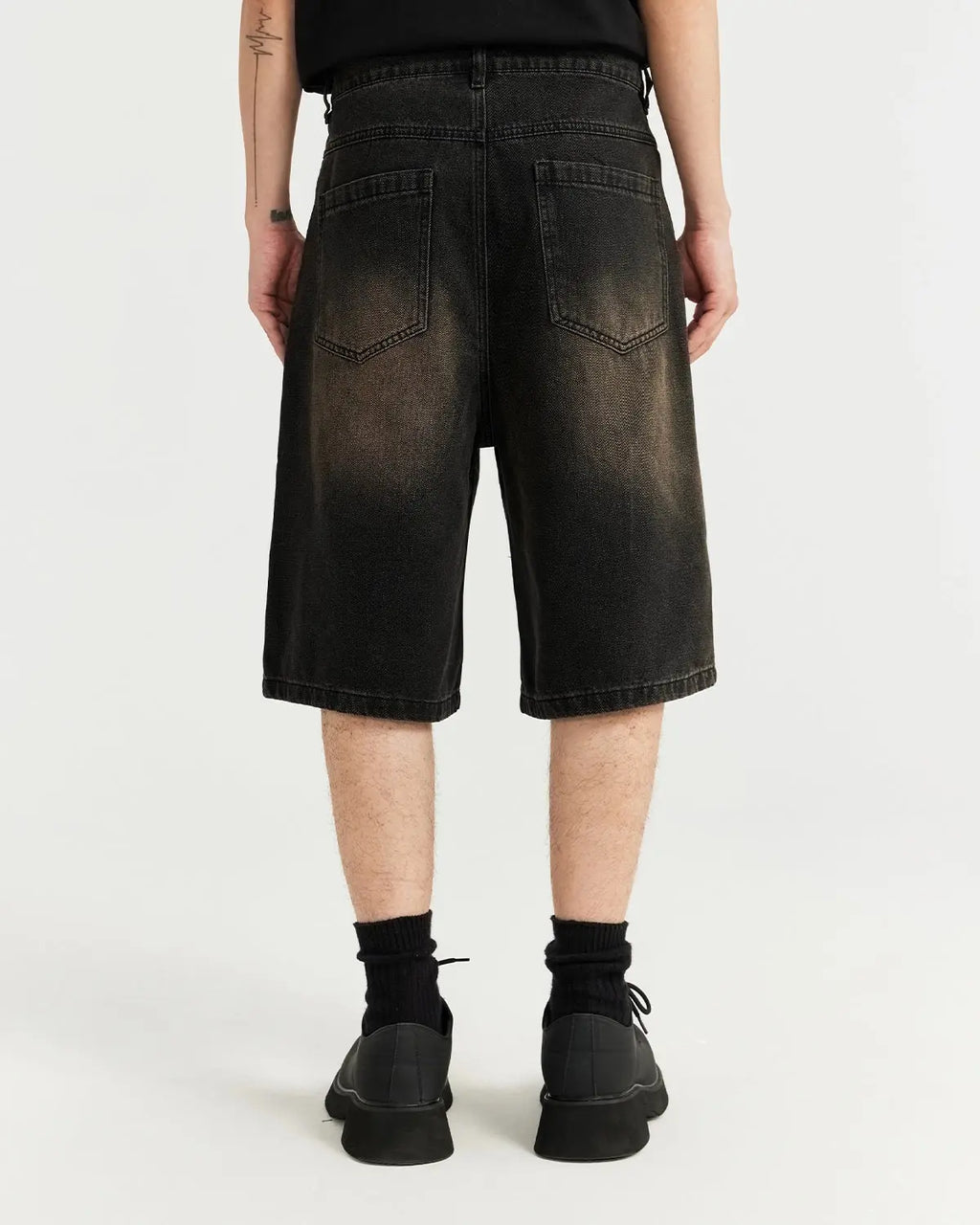 Retro washed Flation streetwear jorts, denim jeans with distressed details and a relaxed fit, styled for casual wear.