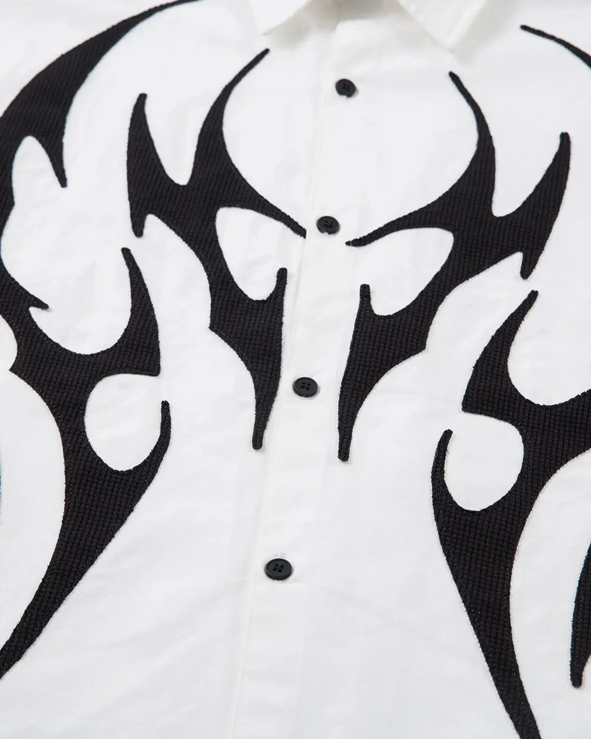 Inflation Streetwear layered tribal graphic T-shirt featuring bold tribal patterns on a casual streetwear shirt.