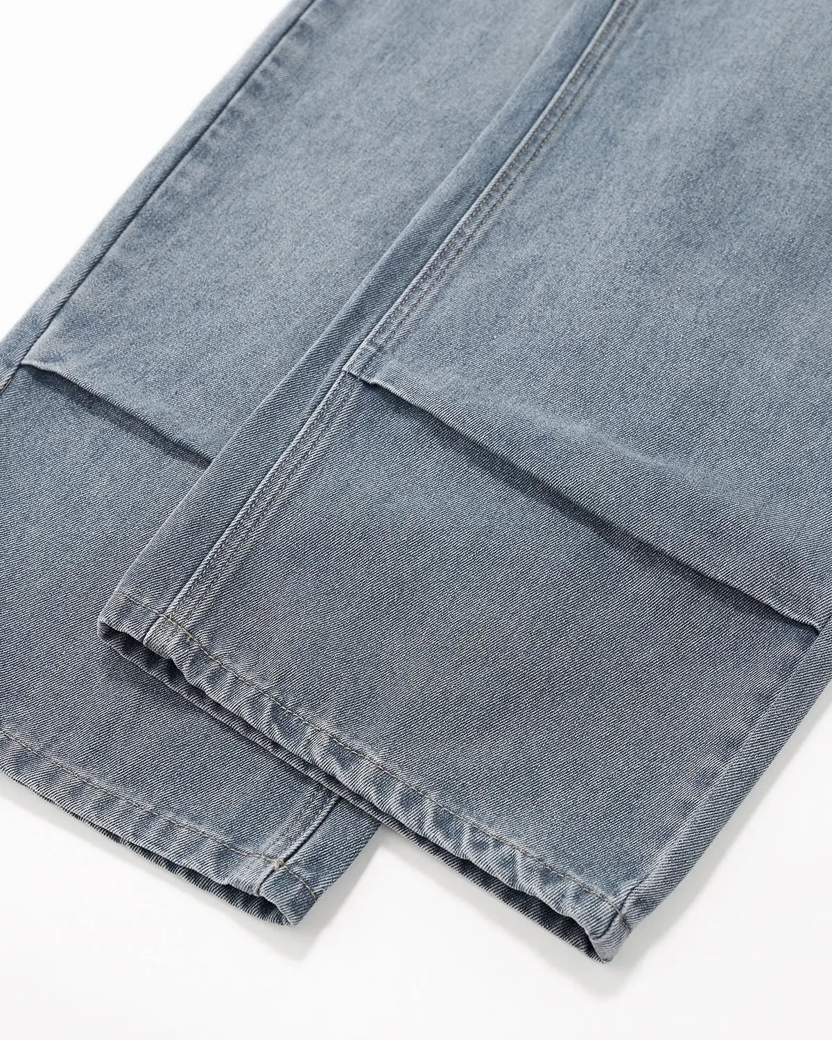Acid wash detachable bandana baggy jeans by Flation featuring a relaxed fit, streetwear style, and bold denim design.