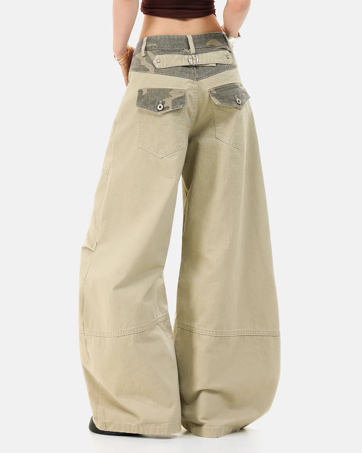 Camo patchwork barrel pants from INFLATION Streetwear featuring a relaxed fit and bold camo and patchwork design.