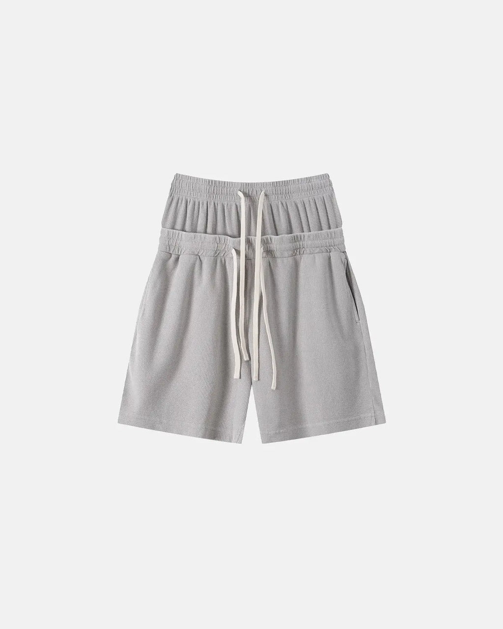 Inflation Streetwear double waist acid wash waffle shorts, stylish men's pants with a relaxed fit and textured fabric.