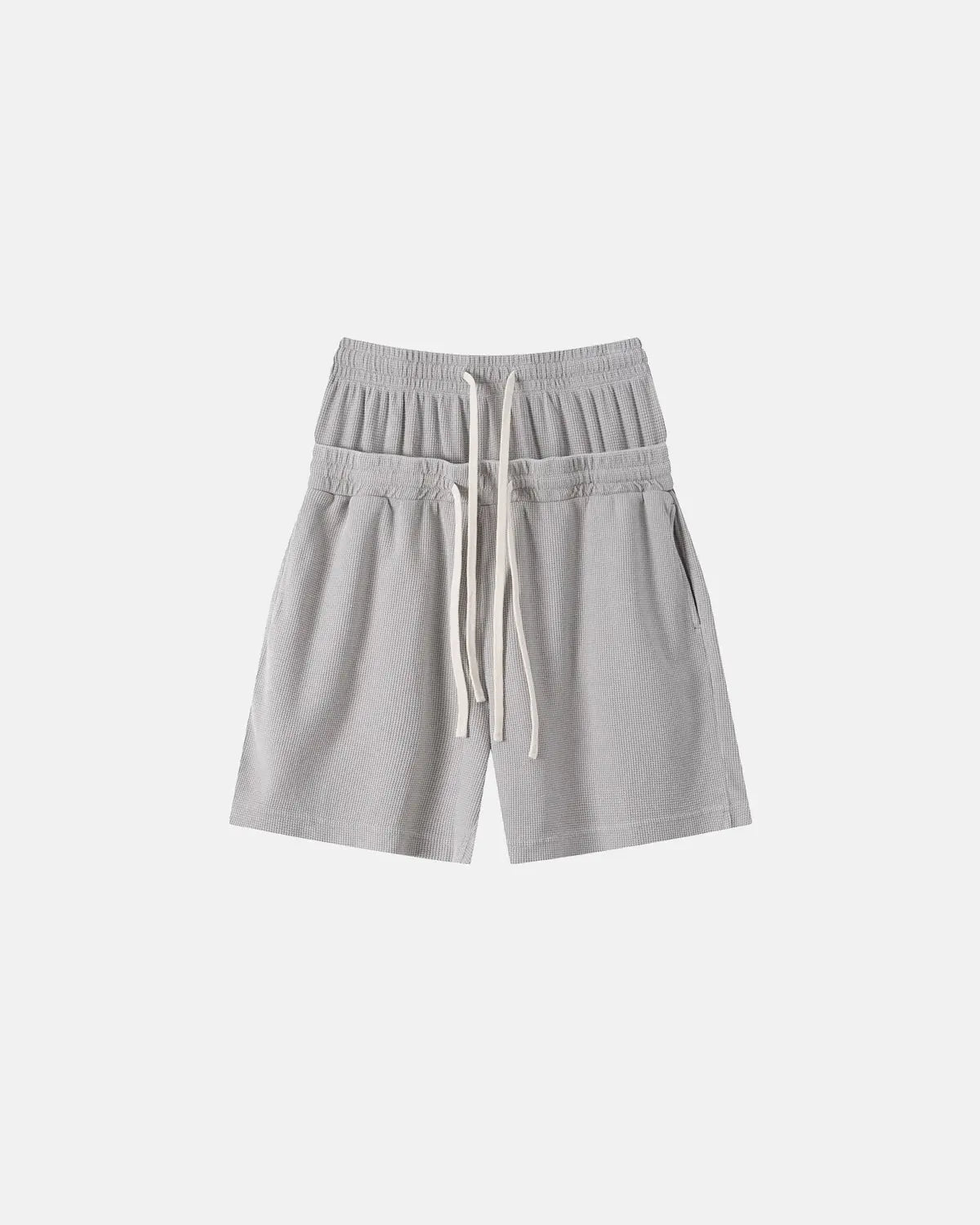 Inflation Streetwear double waist acid wash waffle shorts, stylish men's pants with a relaxed fit and textured fabric.
