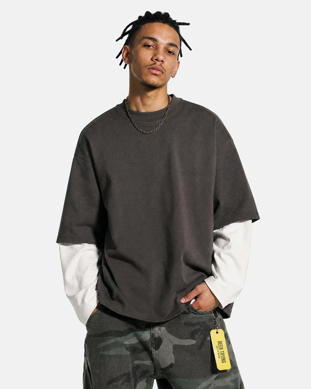 Color block long sleeve tee by Flation Streetwear featuring bold color blocks and casual fit on a model.