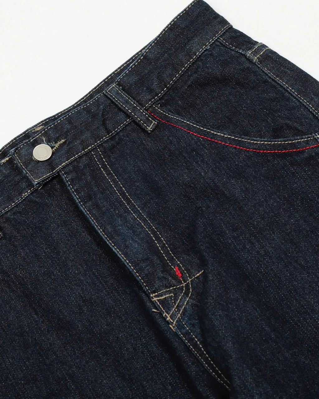 Raw blue deconstructed baggy jeans by INFLATION Streetwear, featuring loose fit and distressed detailing.