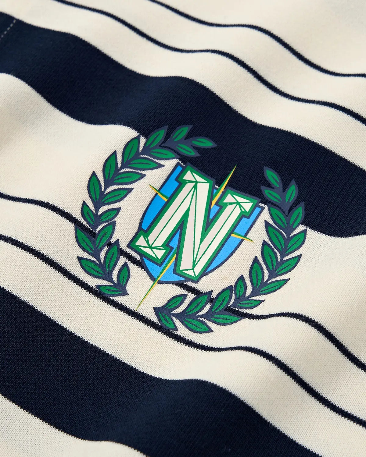 Flation striped rugby polo shirt, casual t-shirt with bold horizontal stripes in various colors, front view showing collar and short sleeves.