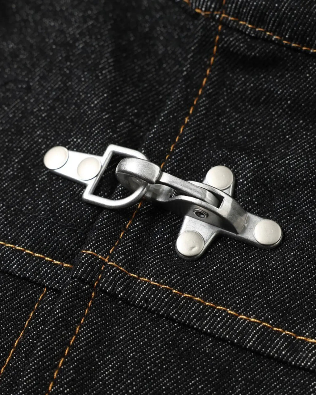 Metal toggle raw denim jacket by Flation Streetwear featuring metal buttons and distressed raw denim fabric.