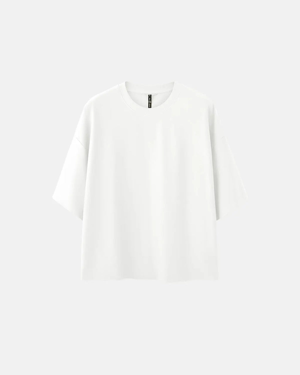 Front view of a white oversized boxy tee by Flation Streetwear, featuring a relaxed fit and minimal design.