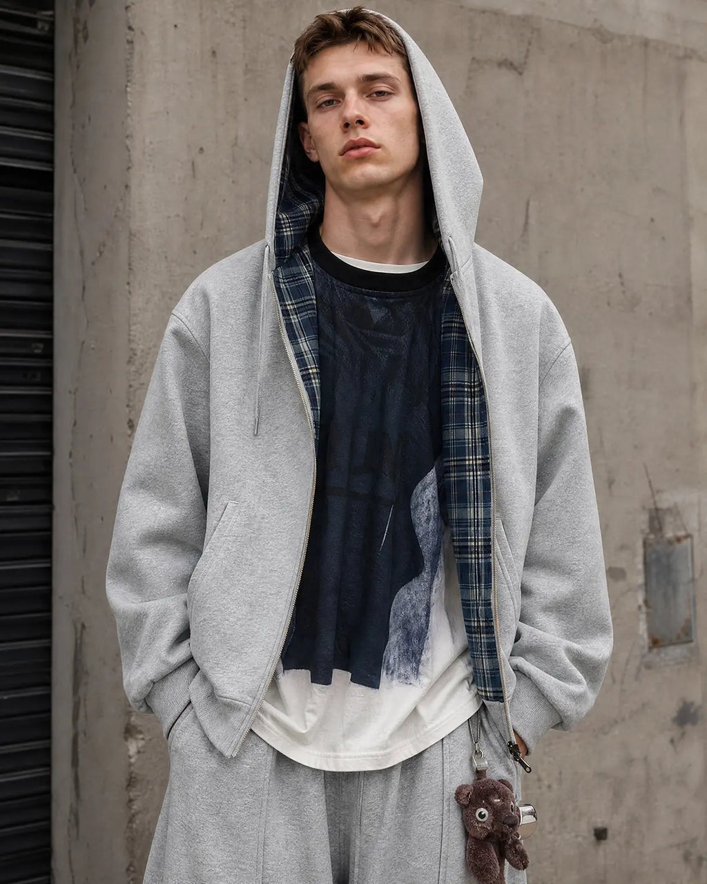 Reversible plaid cropped hoodie from INFLATION Streetwear with bold plaid pattern and casual fit, showing both sides of the hoodie.