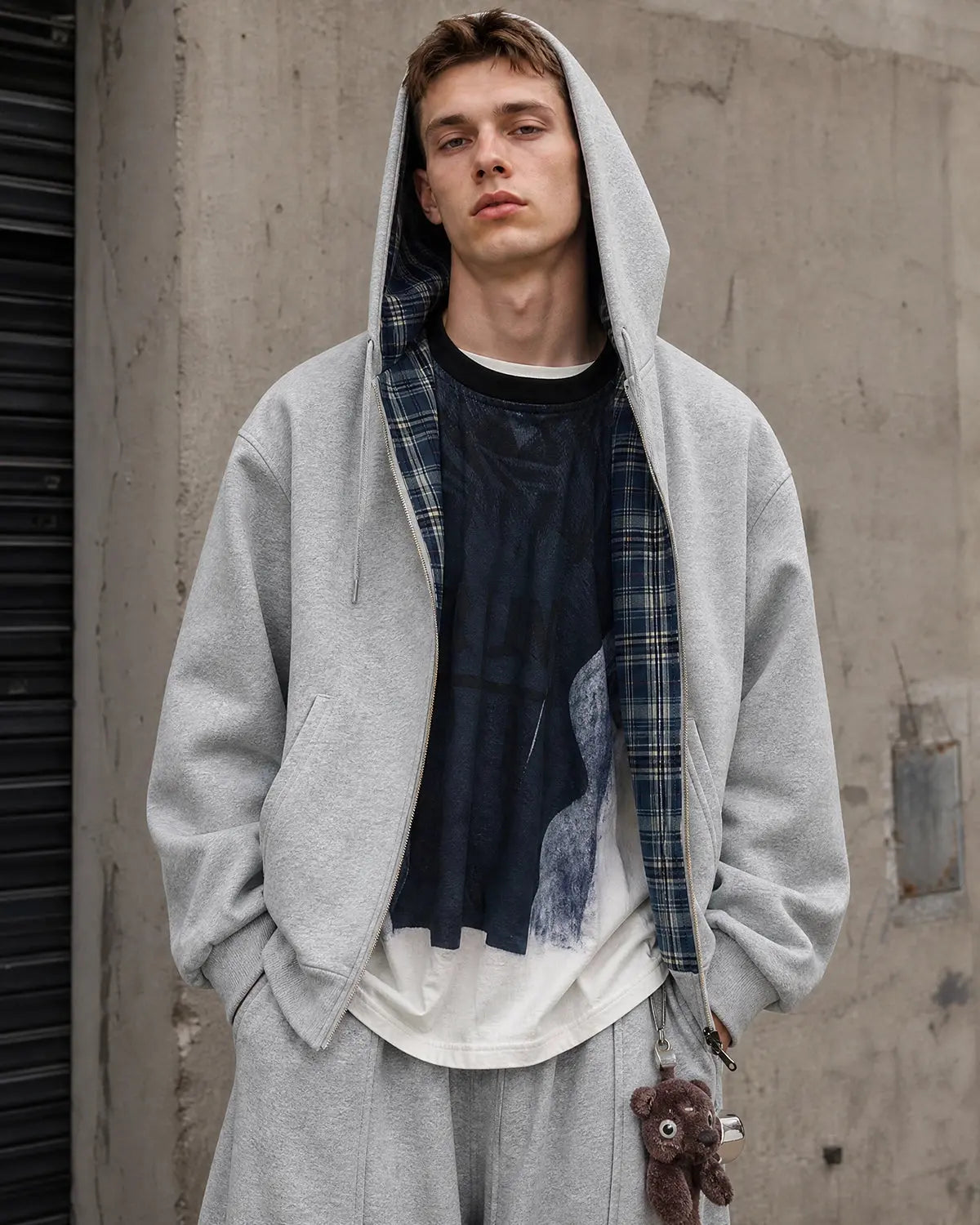 Reversible plaid cropped hoodie from INFLATION Streetwear with bold plaid pattern and casual fit, showing both sides of the hoodie.