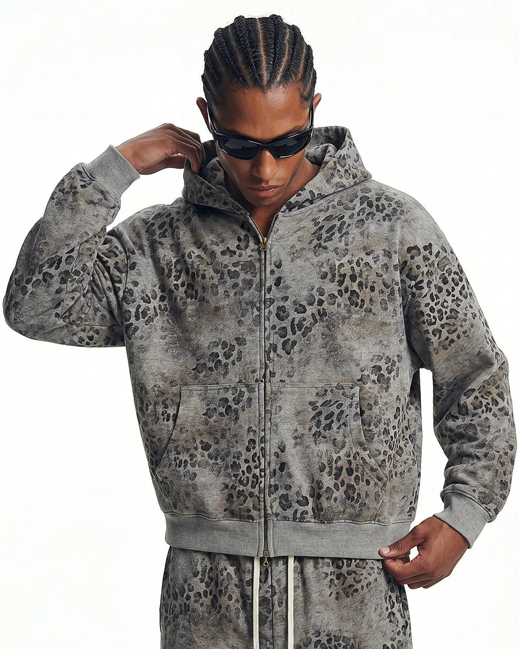Leopard print boxy zip-up hoodie by INFLATION Streetwear, featuring a bold animal print design and front zipper closure.