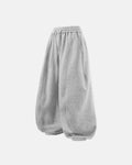 Grey baggy jogger sweatpants from Inflation Streetwear featuring a relaxed fit and elastic waistband.