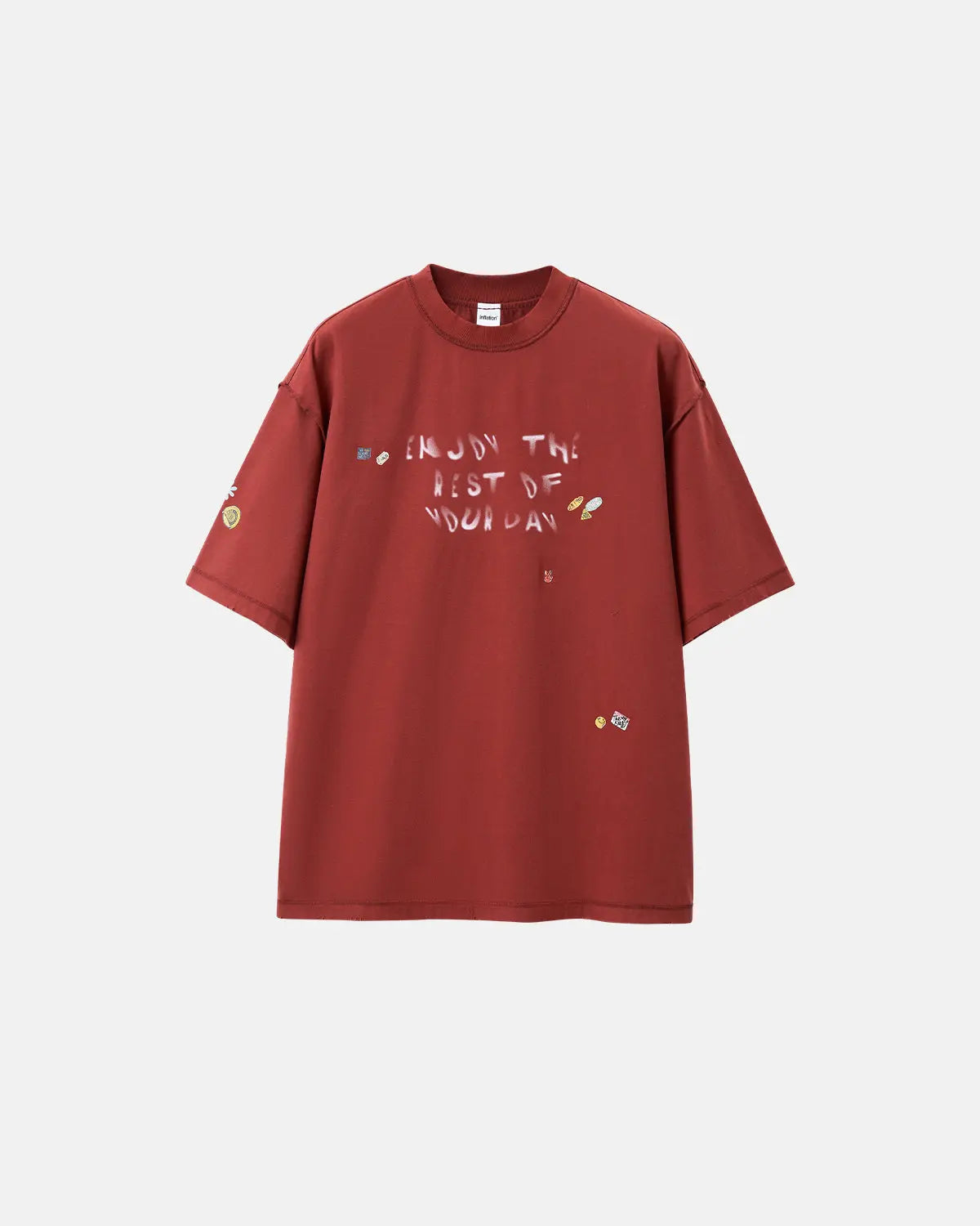 Vintage sticker graphic oversized T-shirt by INFLATION featuring bold streetwear design and colorful retro-inspired print.