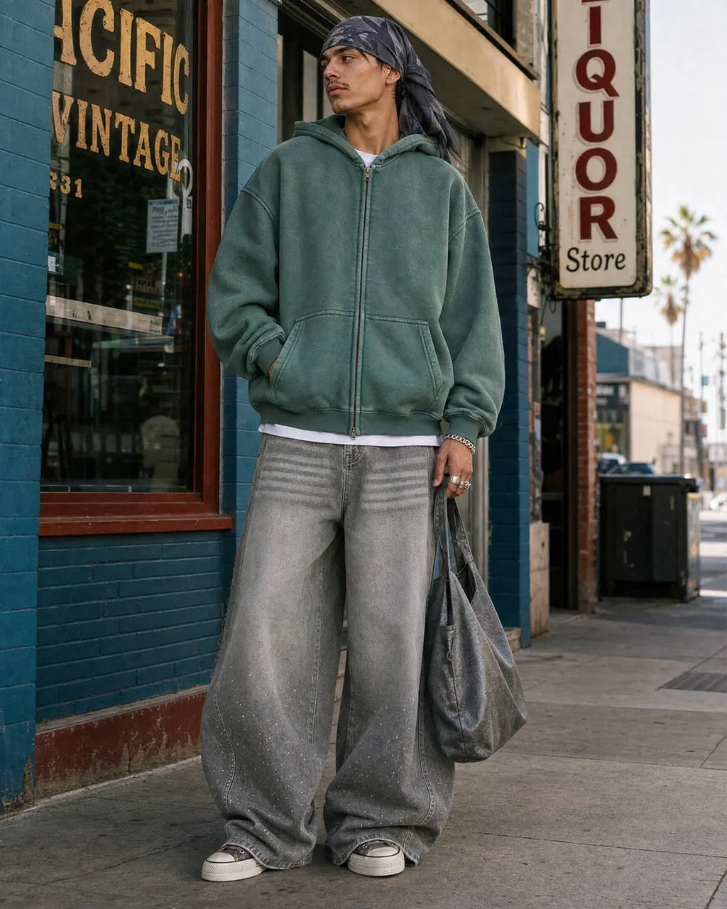 Flation washed distressed fleece zip-up hoodie with a casual fit, featuring a soft texture and front zipper, displayed on a hanger.