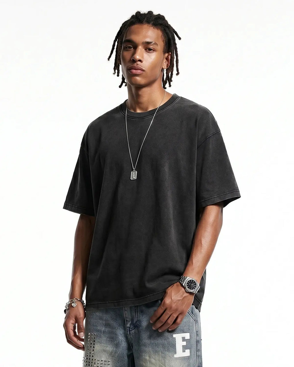 Light blue heavyweight oversized washed tee from Flation Streetwear, showing relaxed fit and faded fabric detail.