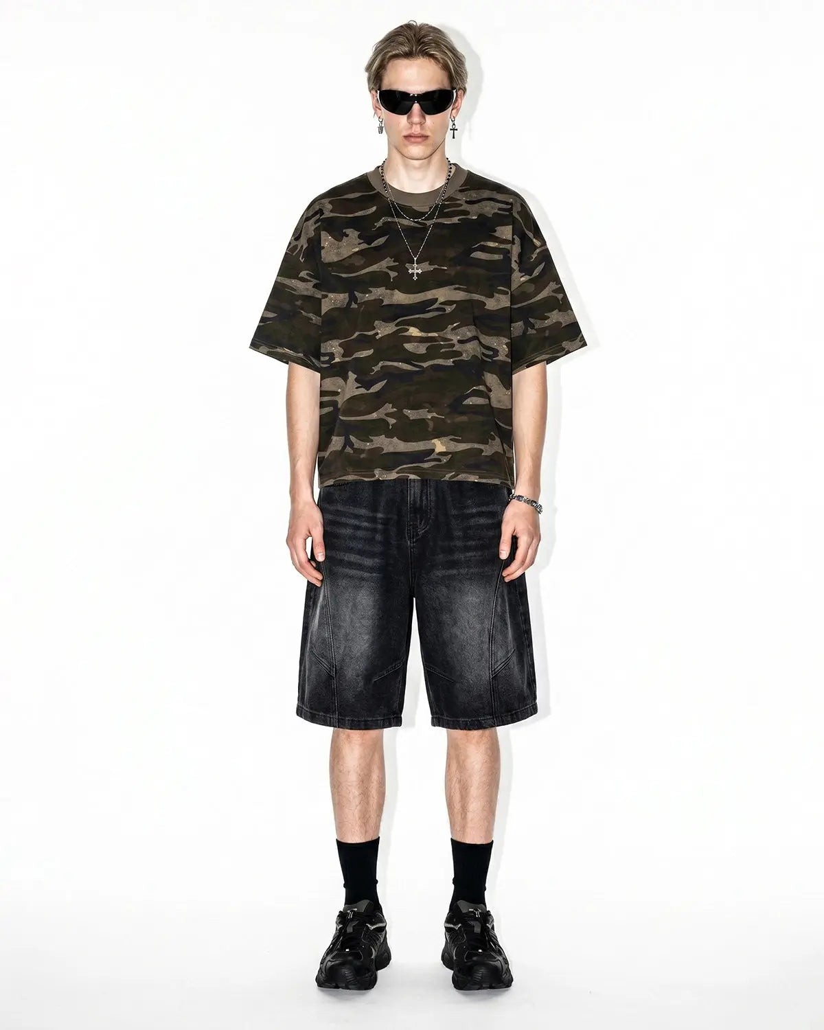 Light blue structured washed denim shorts by INFLATION, stylish streetwear pants with a relaxed fit and distressed details.