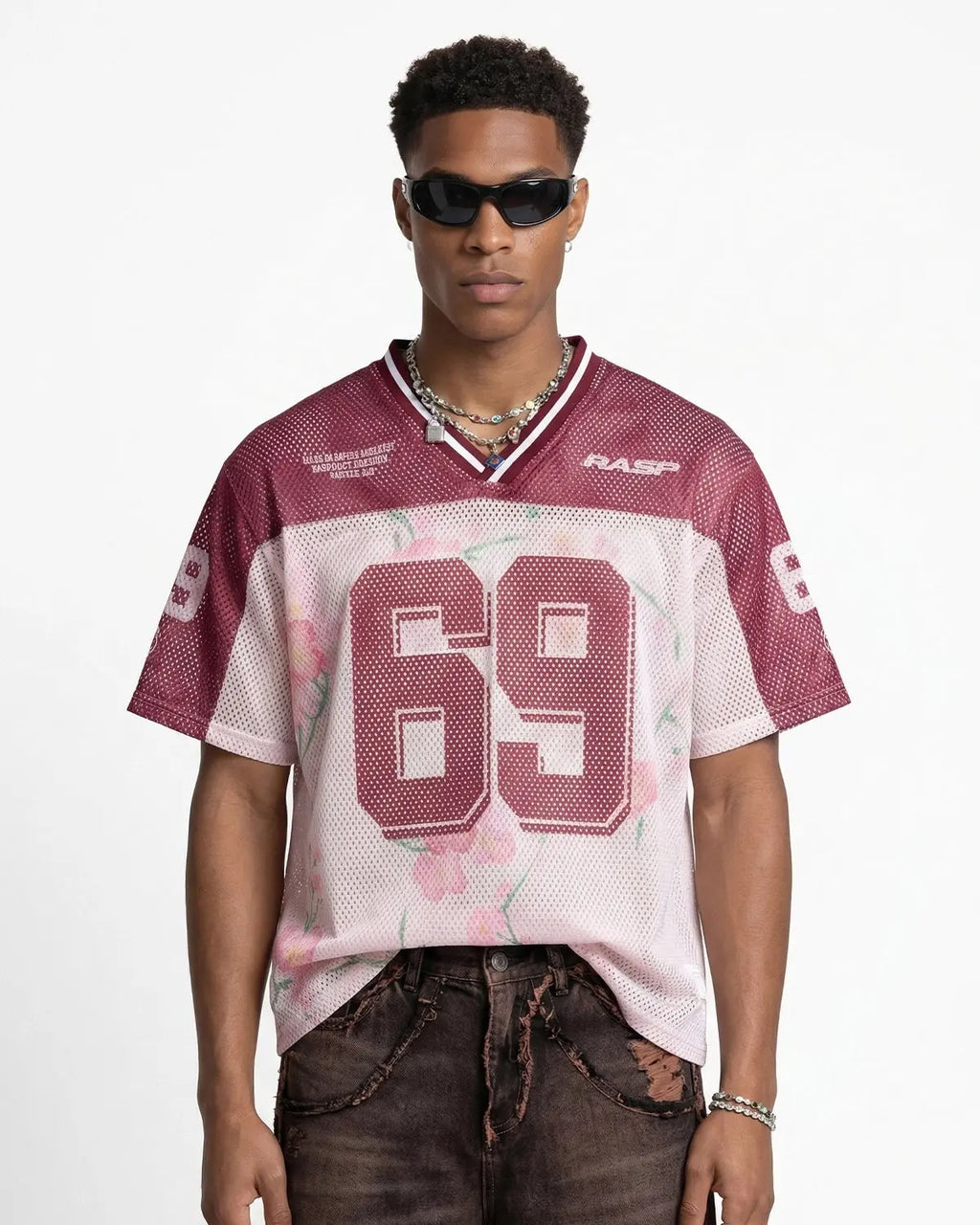 Floral digital print mesh jersey by INFLATION Streetwear, lightweight fabric with vibrant floral design, close-up view.