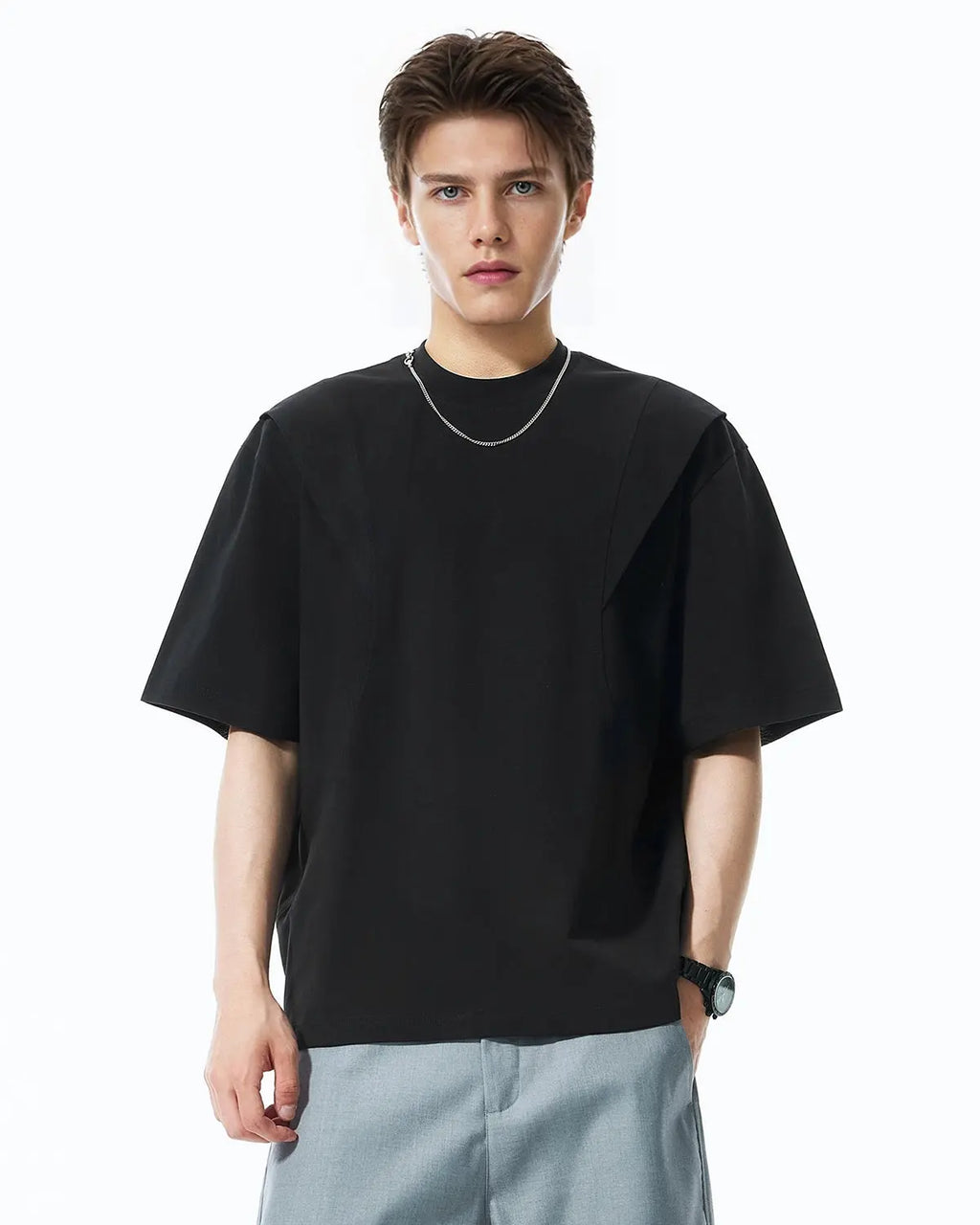 Deconstructed oversized T-shirt by Flation Streetwear featuring loose fit and layered design, displayed on a neutral background.