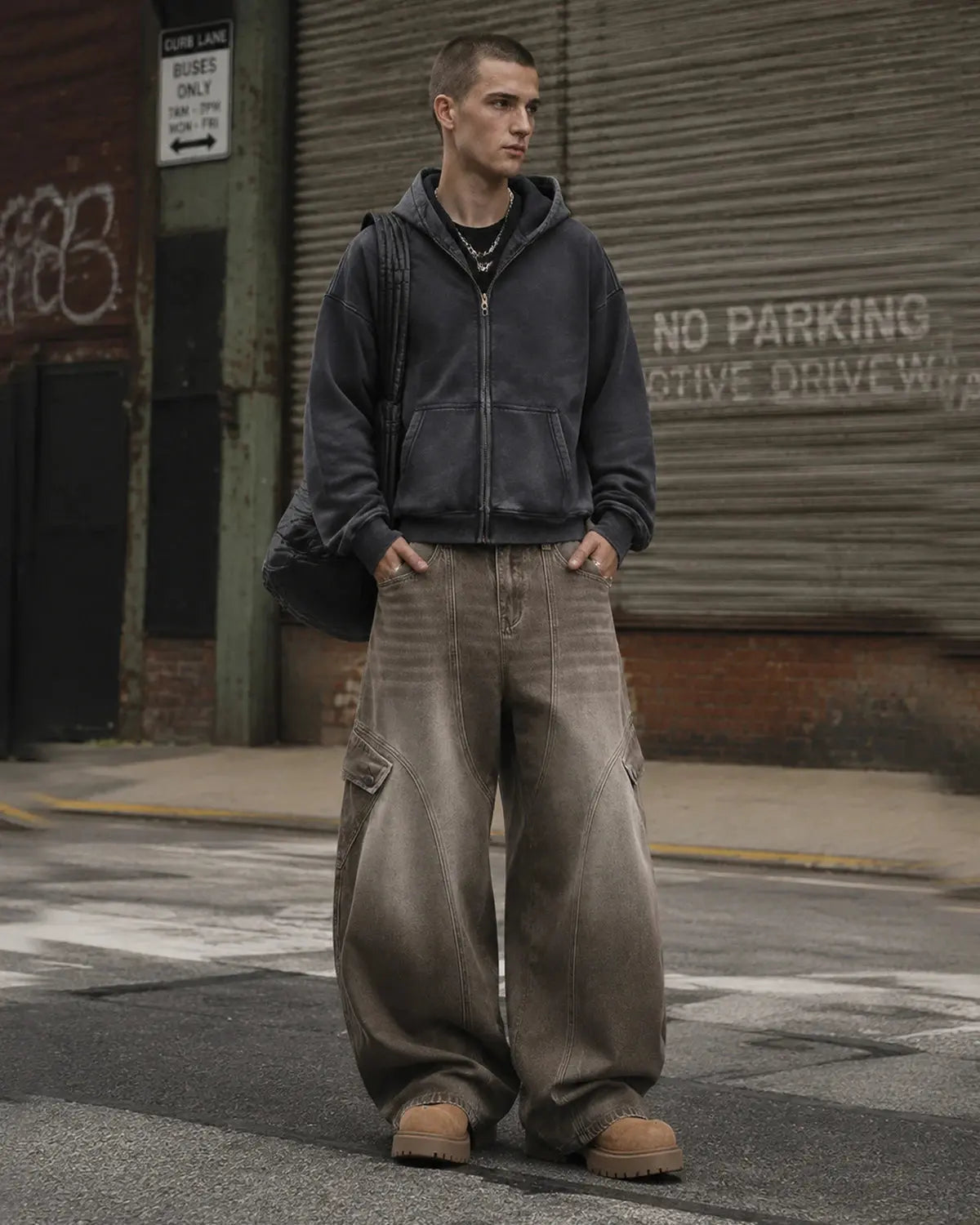 Brown acid wash barrel jeans by Flation featuring a relaxed fit, distressed detailing, and classic streetwear style.