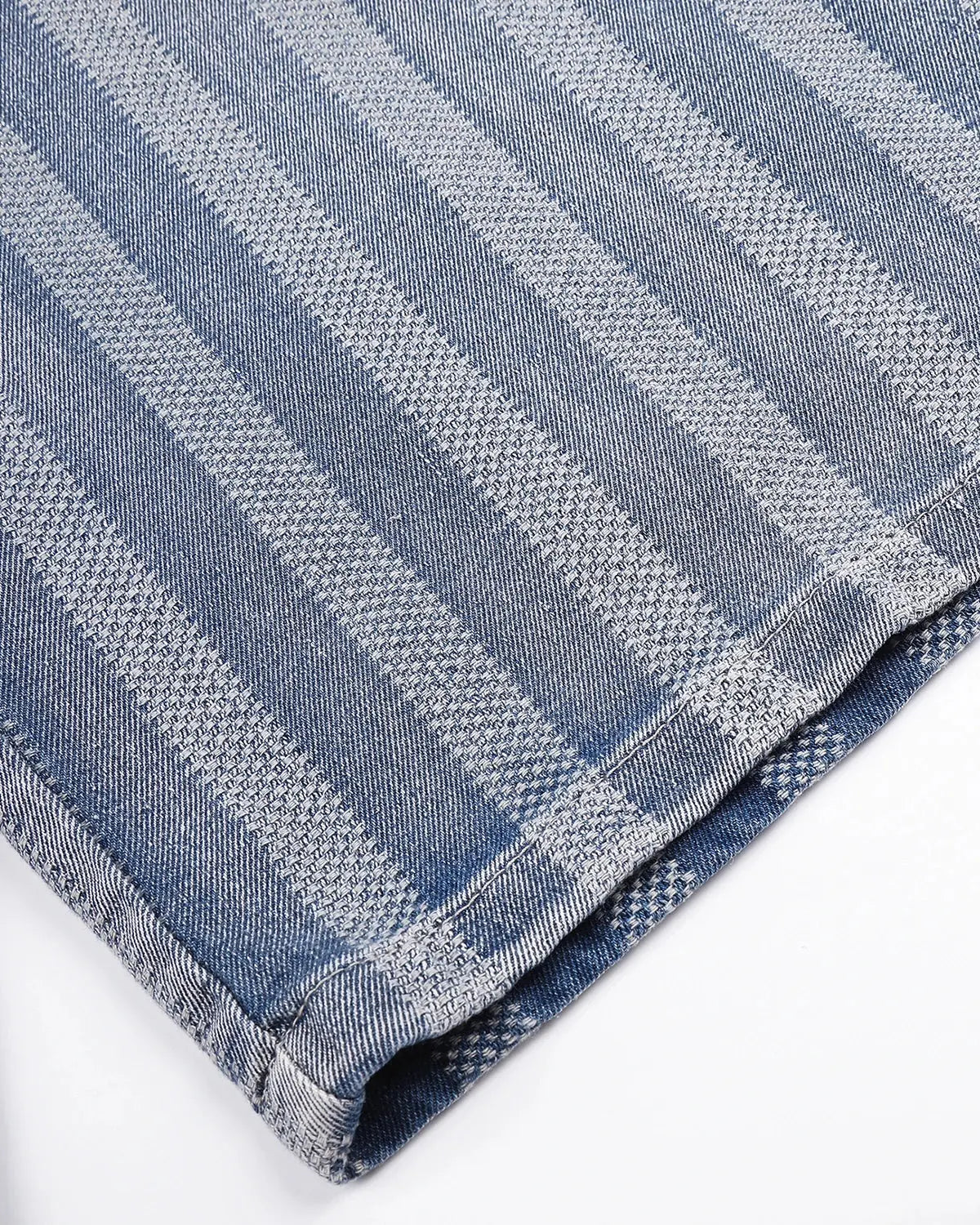 Woven texture baggy jorts by INFLATION featuring a relaxed fit and stylish streetwear design, shown in a casual outdoor setting.