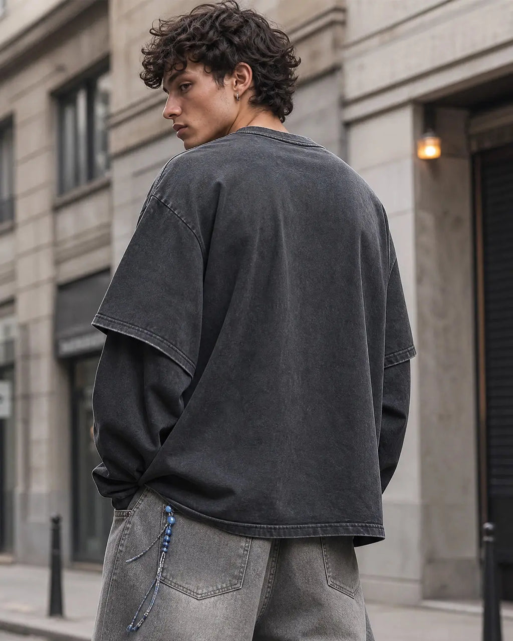 Graphic distressed acid wash layered T-shirt by Flation streetwear, featuring a casual, trendy design with layered fabric details.