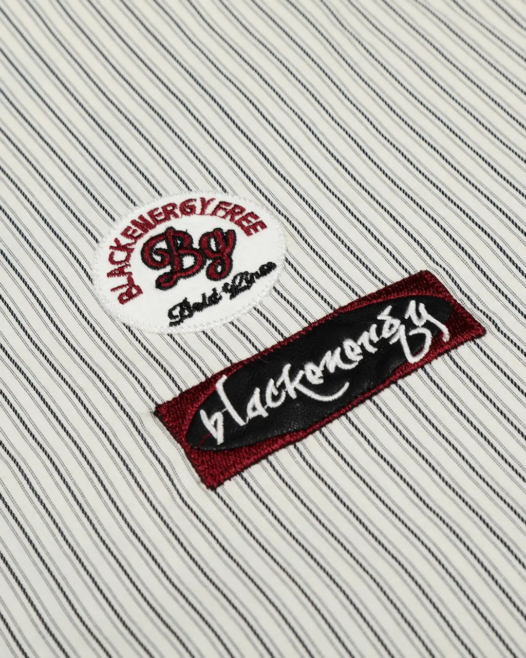 Inflation Streetwear graffiti patch striped shirt with bold colors and urban style, featuring patch details and casual fit.