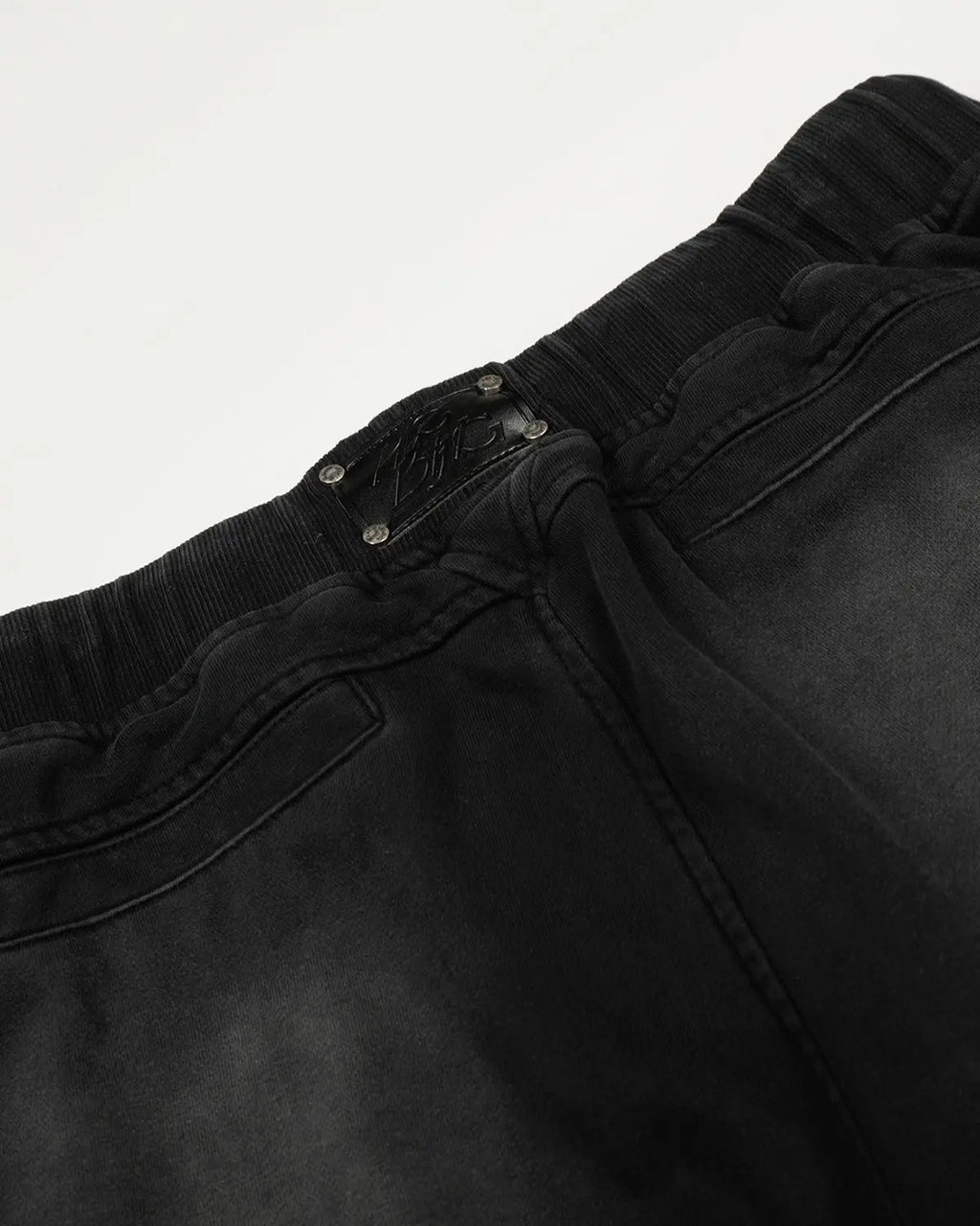 Distressed washed baggy sweatpants from INFLATION streetwear collection, casual fit with a worn, vintage look.
