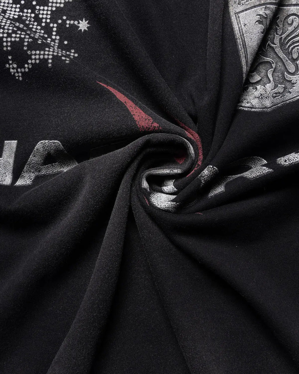 Distressed washed graphic T-shirt by INFLATION featuring a vintage-inspired design and casual streetwear style.
