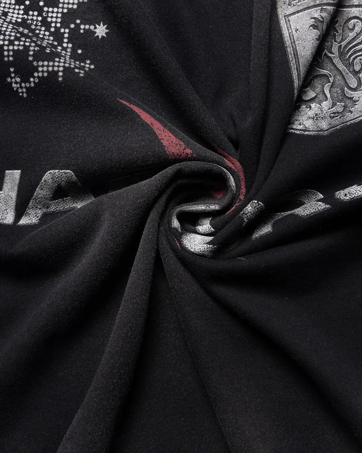 Distressed washed graphic T-shirt by INFLATION featuring a vintage-inspired design and casual streetwear style.