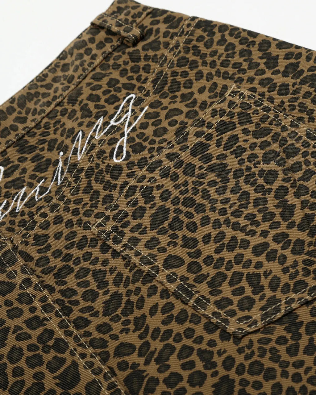 Leopard print barrel longline shorts by INFLATION, featuring a stylish longline design and bold animal print fabric.
