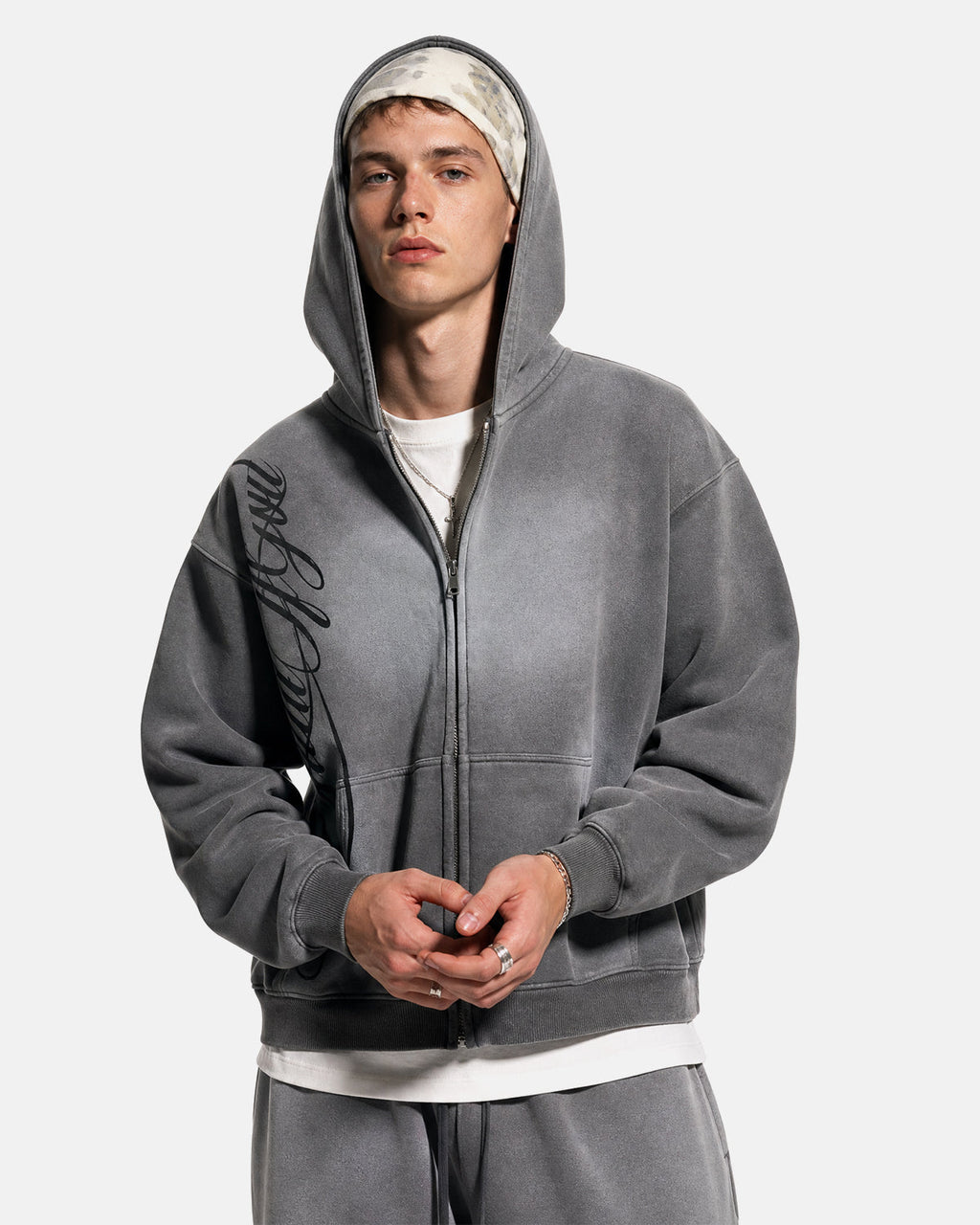 Acid wash zip-up hoodie by Flation Streetwear featuring a casual fit, front zipper, and distressed acid wash fabric.