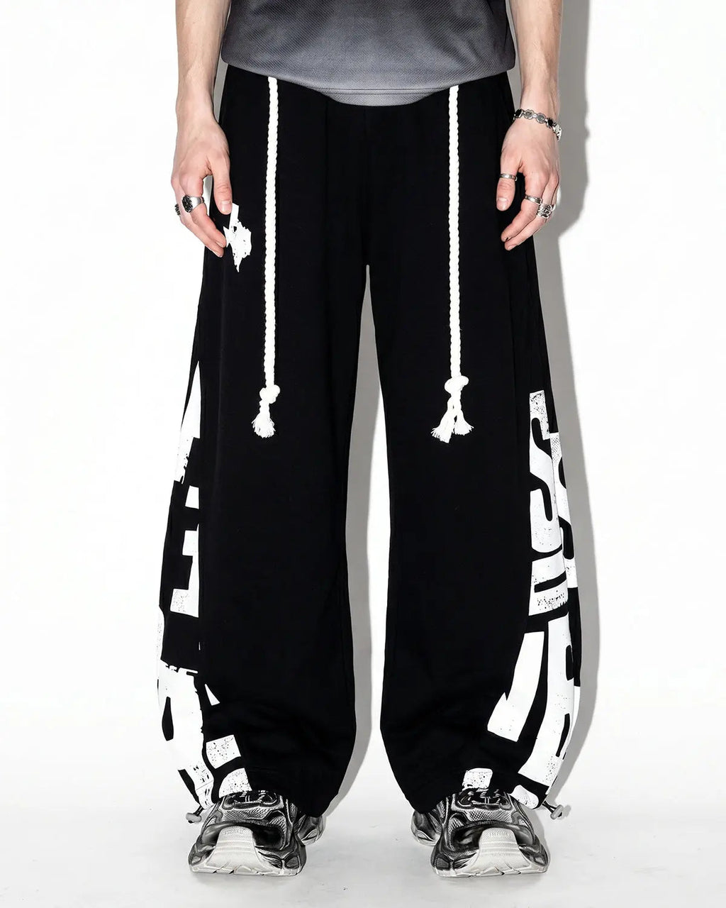 Inflation Streetwear Graphic Barrel Sweatpants featuring bold print, relaxed fit, and comfortable fabric in a stylish streetwear design.