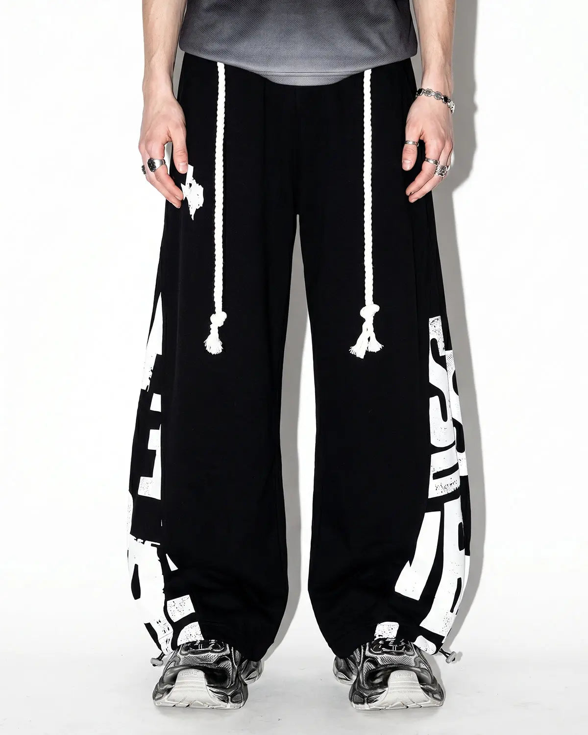Inflation Streetwear Graphic Barrel Sweatpants featuring bold print, relaxed fit, and comfortable fabric in a stylish streetwear design.