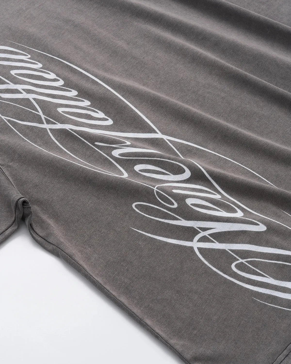 Inflation Streetwear Boxy Script Graphic Washed T-Shirt with bold printed design on soft fabric, casual streetwear style.