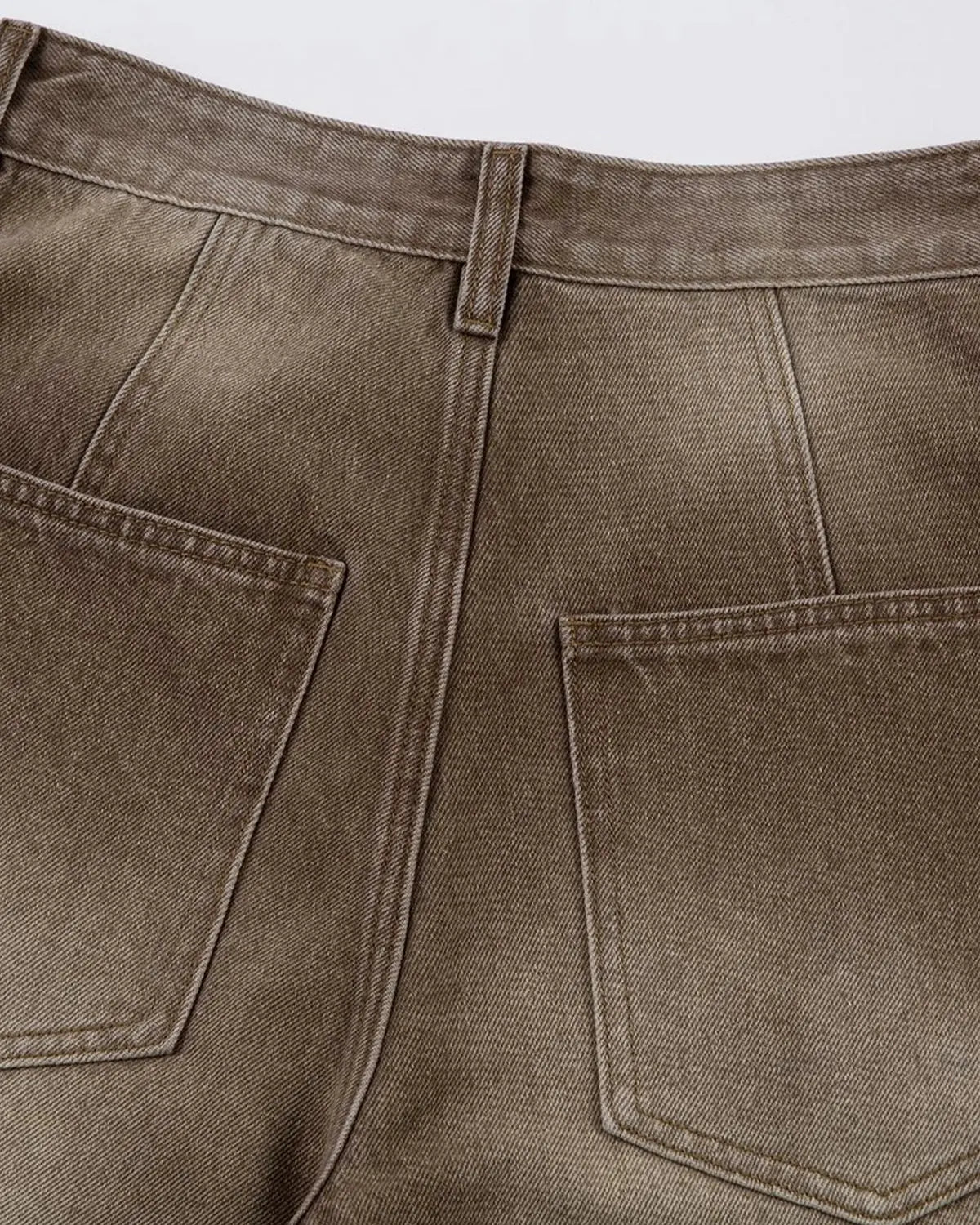 Brown acid wash barrel jeans by Flation featuring a relaxed fit, vintage-style wash, and classic five-pocket design.