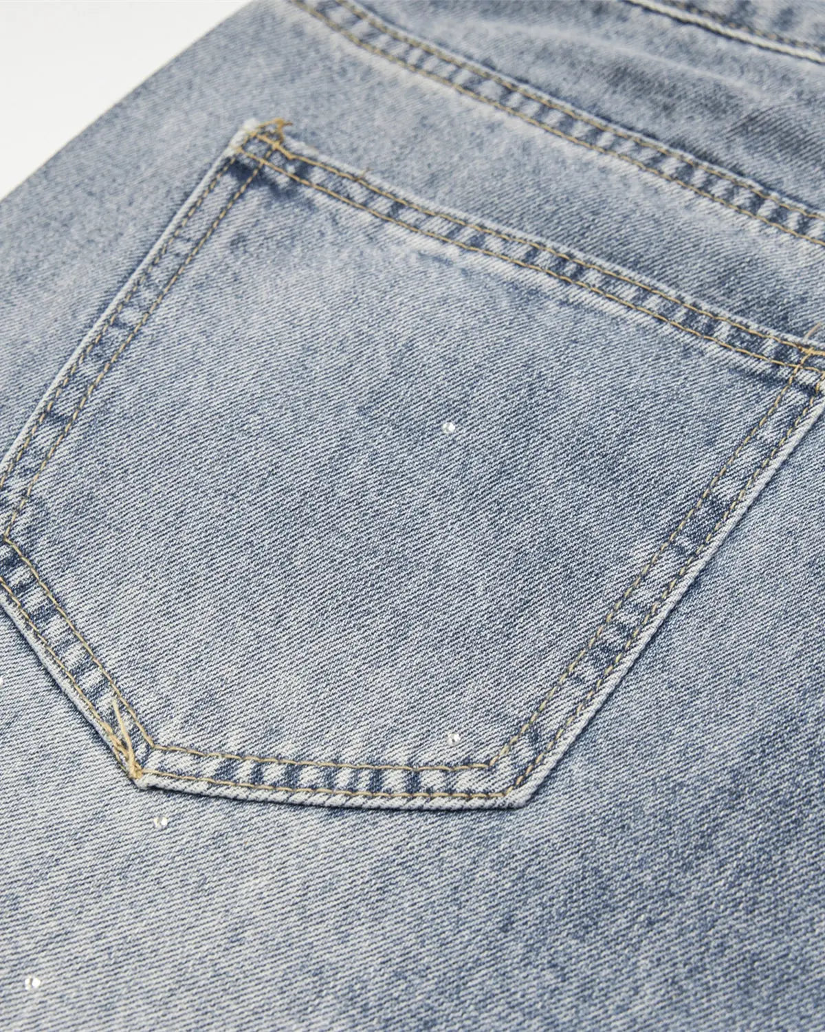 Flation Studded Rhinestone Baggy Jeans with distressed details, oversized fit, and rhinestone embellishments for streetwear style.