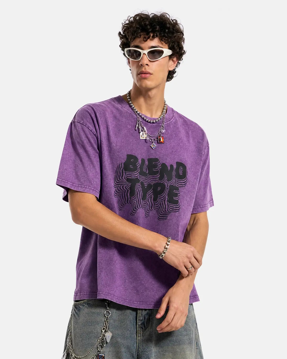 Purple washed oversized graphic T-shirt from INFLATION Streetwear featuring bold print and relaxed fit.