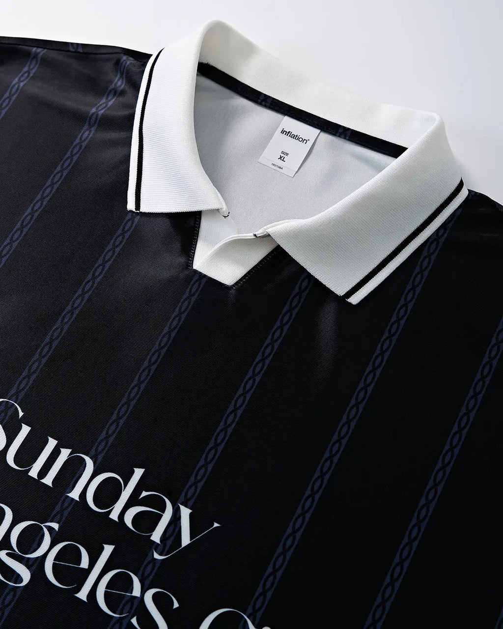 Vintage striped polo jersey by INFLATION featuring classic design and vibrant colors, styled for streetwear fashion.