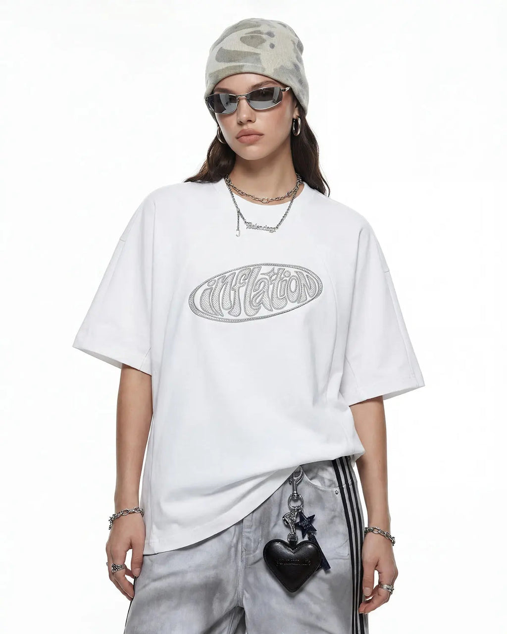 Hollow embroidered graphic T-shirt by INFLATION featuring bold embroidery and streetwear style on soft cotton fabric.