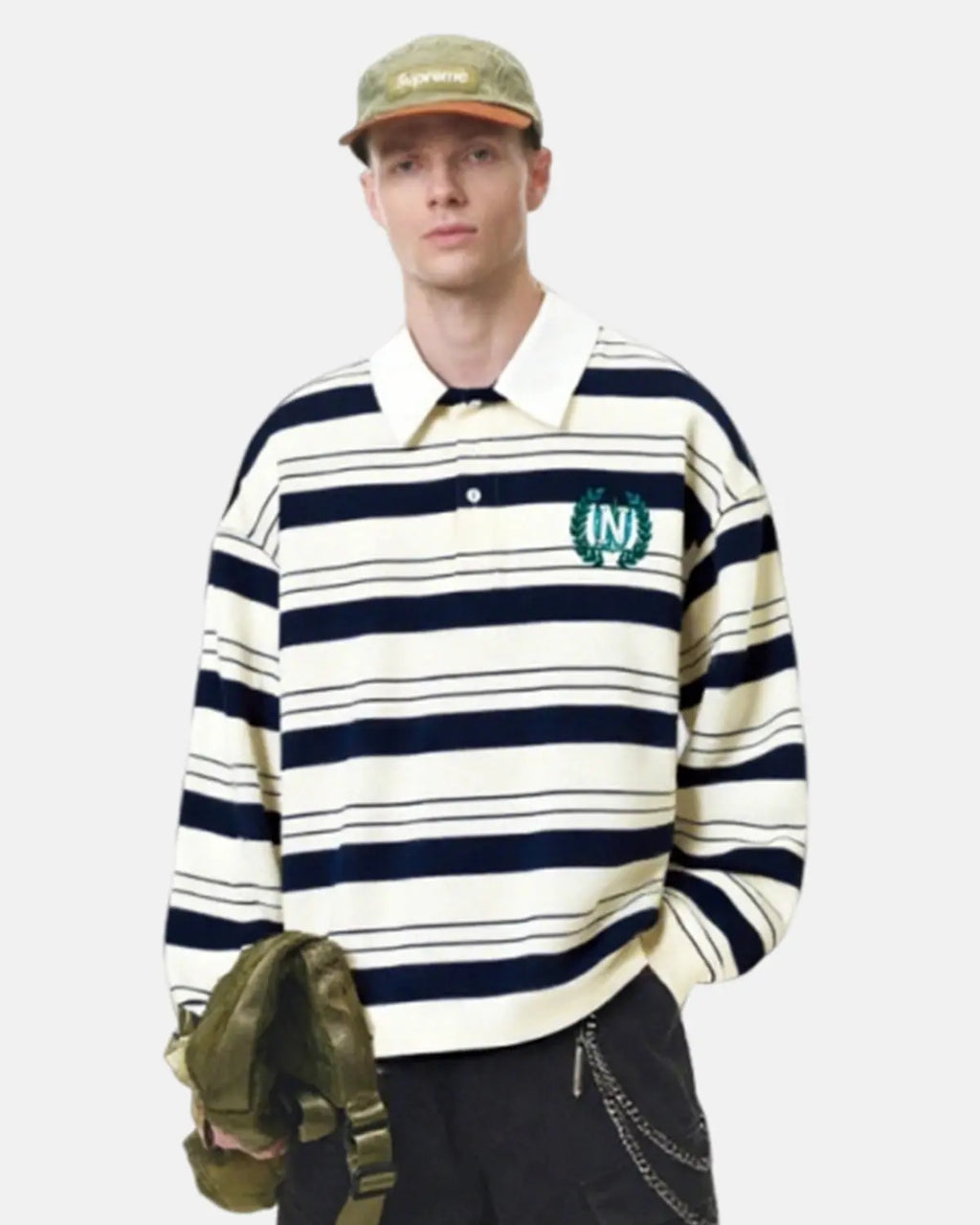 Striped rugby polo shirt by Flation Streetwear, showing a close-up of the blue and white striped pattern and classic collar.