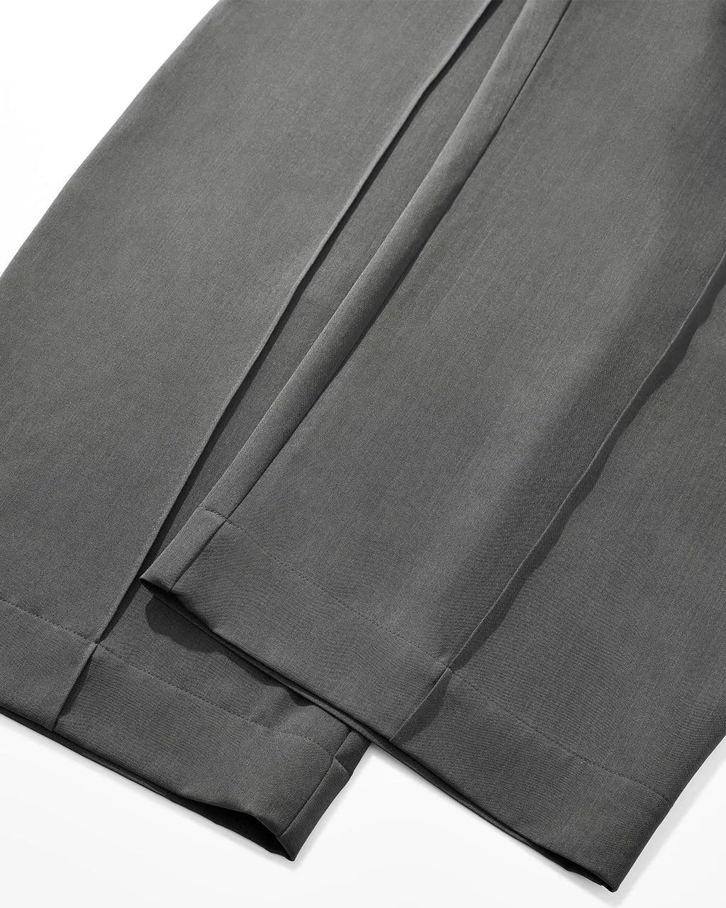 Flation Cleanfit Baggy Suit Pants in neutral color, relaxed fit, and stylish streetwear design, showcased on a plain background.