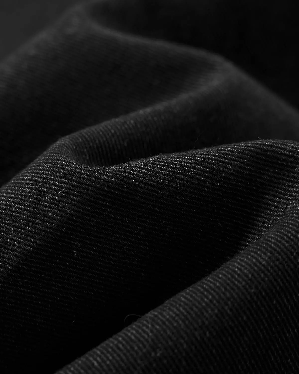 Acid washed black barrel jeans by Flation featuring a relaxed fit and distressed denim style for streetwear fashion.