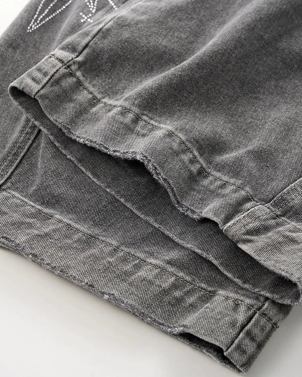 Flation star graphic rhinestone barrel baggy jeans showing denim fabric, star designs, rhinestones, and relaxed fit style.