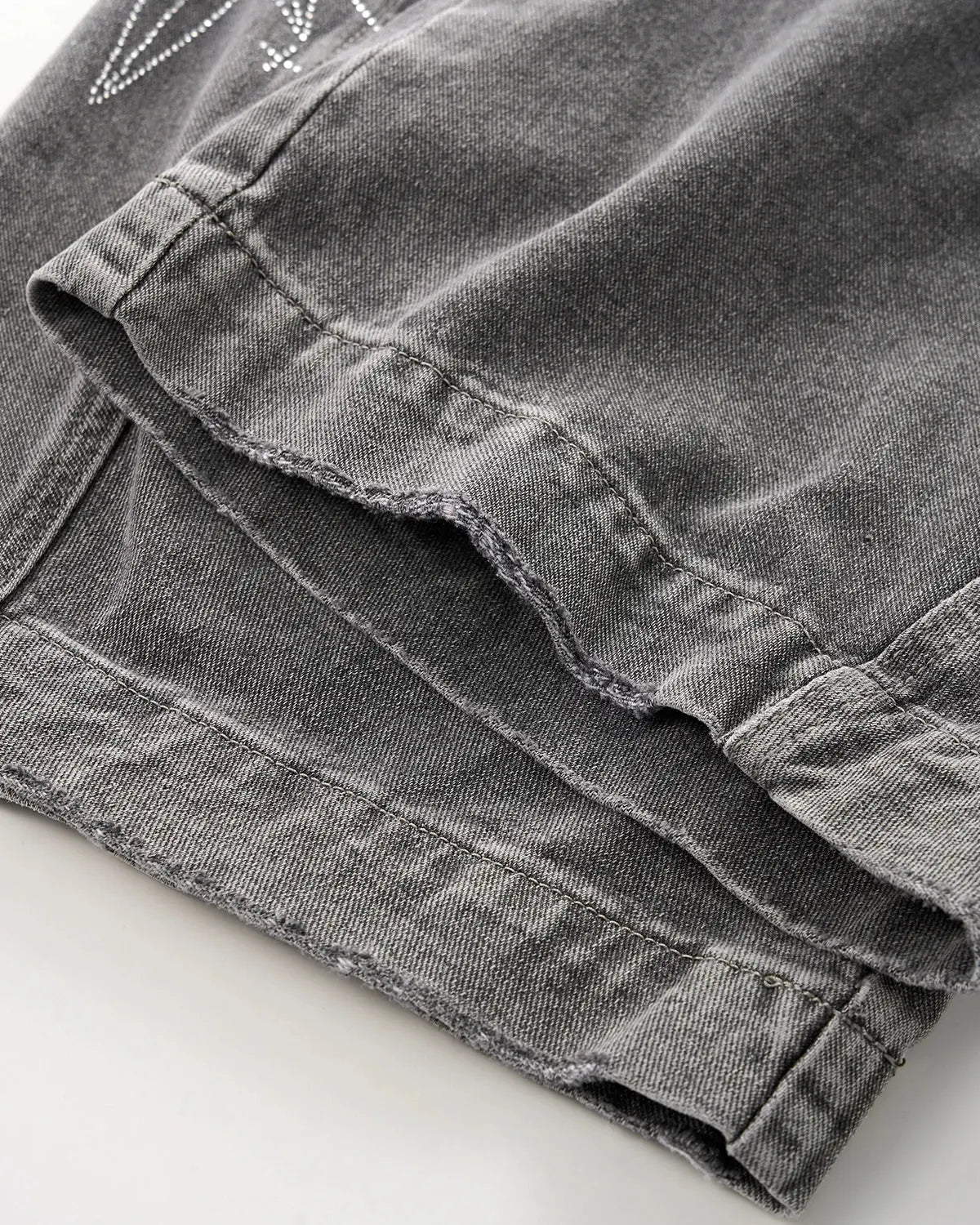 Flation star graphic rhinestone barrel baggy jeans showing denim fabric, star designs, rhinestones, and relaxed fit style.
