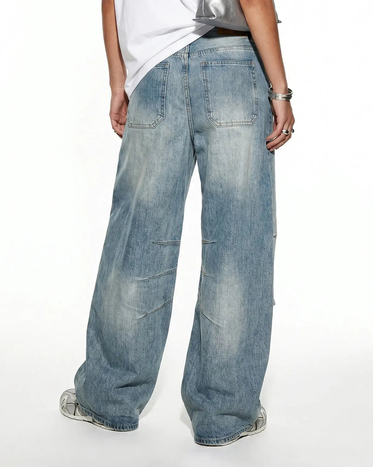 Deconstructed bamboo weave baggy jeans by Flation Streetwear featuring relaxed fit and unique textured fabric.