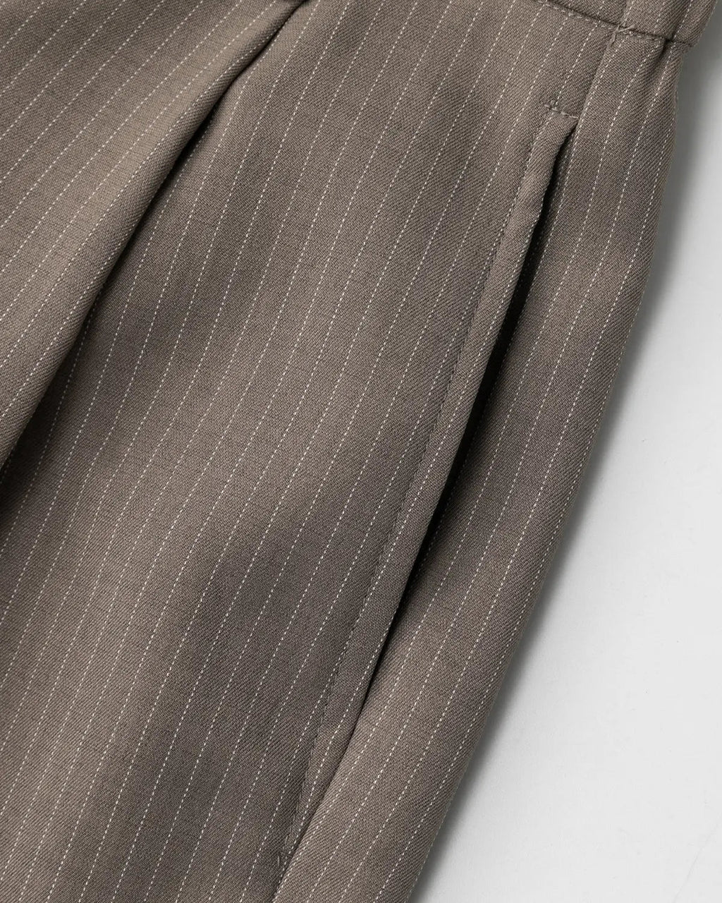 INFLATION pinstripe pleated tailored shorts, stylish pants with a high waist and sharp pleats, perfect for streetwear fashion.
