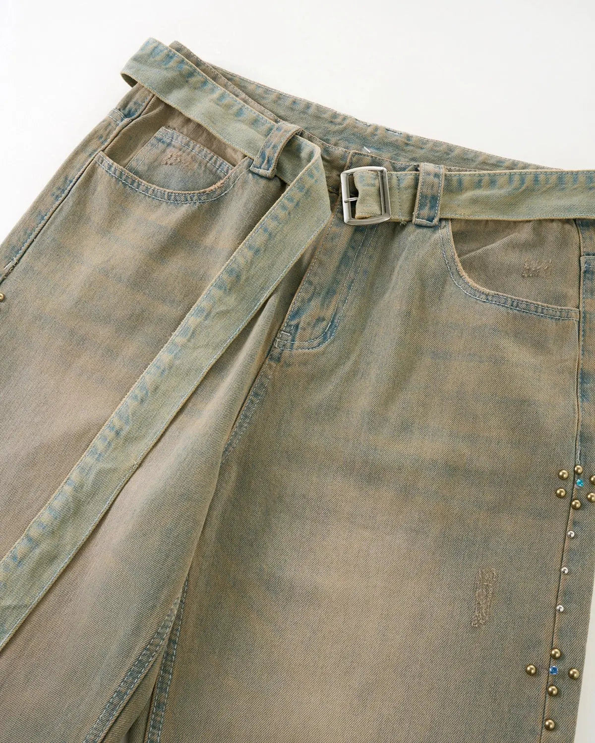 Beaded studded washed baggy jeans by INFLATION Streetwear featuring distressed denim and decorative bead accents.