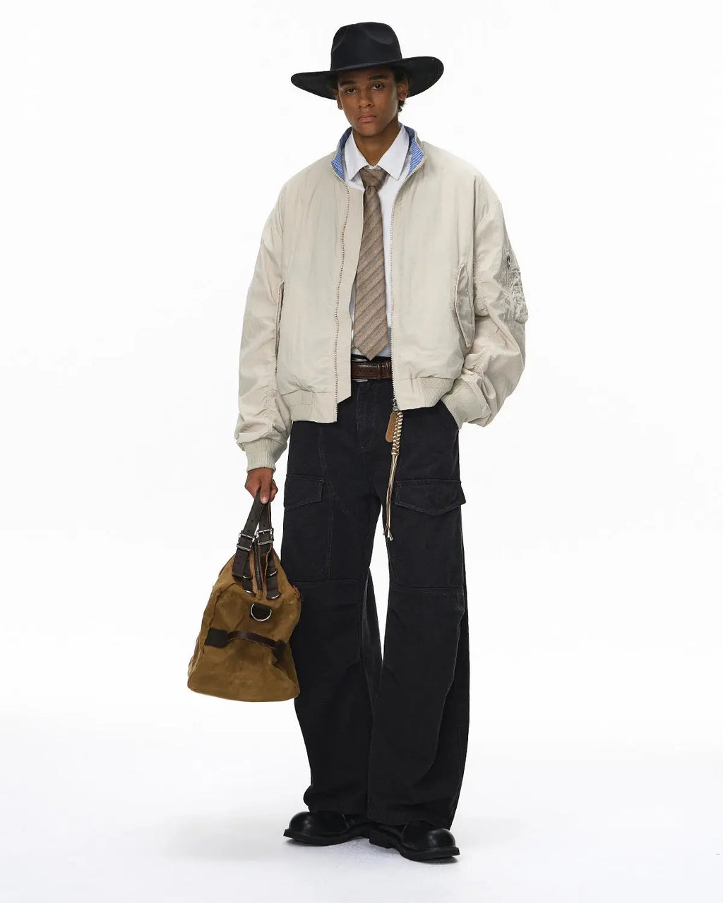 Flation Streetwear cargo pants with multiple pockets, garment washed for a worn-in look, shown in a relaxed fit style.